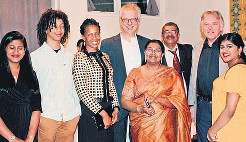 Morten Meldal and Renil Manat with their families and Ernst, a CRL colleague