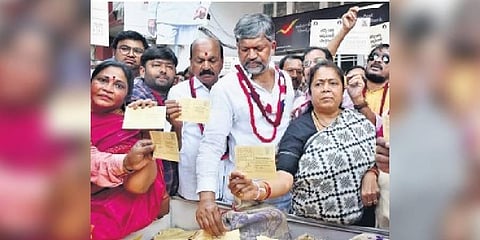 Leaders of the handloom weavers’ community hold a rally from Nizam college ground to General Post Office in Hyderabad on Monday to send postcards and letter to PM Modi | Jwala