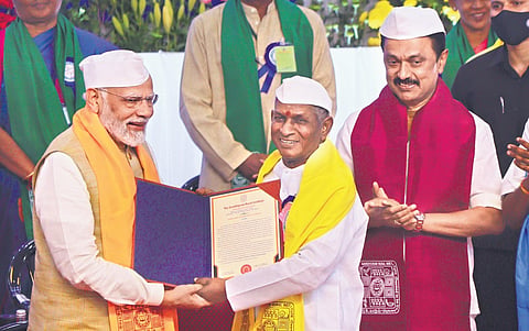 PM Narendra Modi awards a honorary doctorate to music maestro Ilaiyaraaja at the 36th convocation of Gandhigram Rural Institute in Dindigul on Friday as CM M K Stalin looks on  | K K SUNDAR