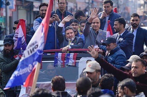 Apni Party President Altaf Bukhari waves at supporters as he arrives for a public rally, in Srinagar. (Photo | PTI)