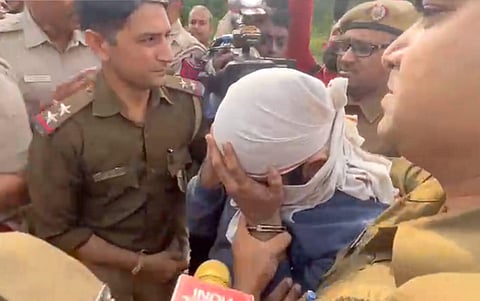 Aaftab Amin Poonawala, accused to have murdered his live-in partner Shraddha Walkar, being brought to the Mehrauli forest area. (Photo | PTI)