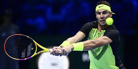 Rafael Nadal returns the ball to Felix Auger-Aliassime during their singles tennis match of the ATP World Tour Finals.(Photo | AP)