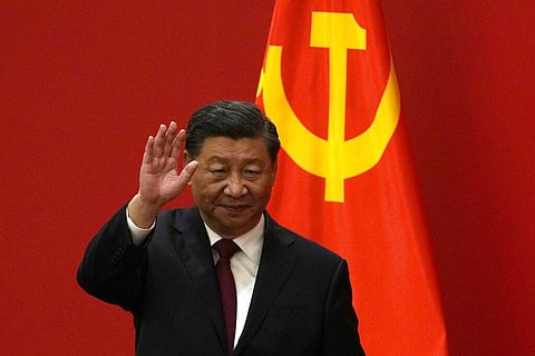 Chinese President Xi Jinping waves at an event to introduce new members of the Politburo Standing Committee in Beijing, Oct. 23, 2022. (Photo | AP)