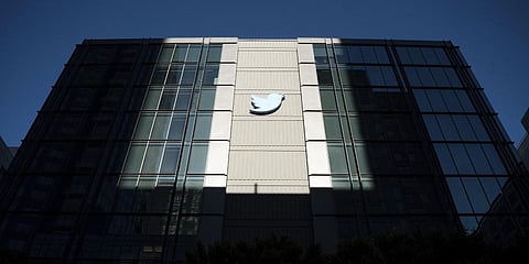A Twitter logo hangs outside the company's San Francisco offices on Tuesday, Nov. 1, 2022. (Photo | AP)