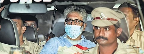 Bhima-Koregaon accused Gautam Navlakha being taken to the CPI(M) office building for house arrest, in Mumbai on Saturday | PTI