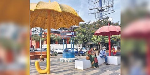 ​  Citizens take a break by utilising the urban seation concept at the traffic islands at the busy Cyber Towers and Shilparamam junctions in Hyderabad on Saturday | Jwala  ​