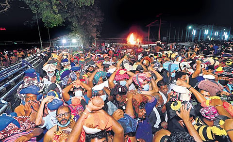 The long queue of pilgrims in front of the holy steps at Sabarimala Lord Ayyappa temple