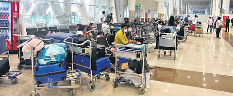 Passengers wait at the Chennai airport. (File Photo | Ashwin Prasath, EPS)