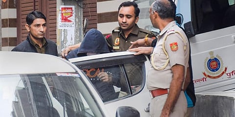 Aaftab Poonawala, accused of killing his partner Shraddha Walkar, being brought to his residence at Chhatarpur as part of the ongoing investigation. (Photo |PTI)