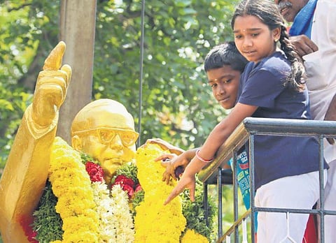In this representational image, children paying tribute to Dalit icon Dr B R Ambedkar, at Tallakulam, Madurai, during the leader's birth anniversary. (Photo | KK Sundar)