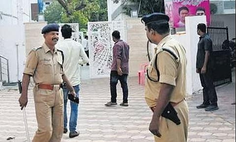 Police personnel stand guard as I-T teams conduct searches at one of the premises of Malla Reddy and his associates in Hyderabad. (Photo | Vinay Madapu, EPS)