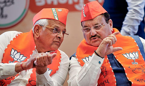 BJP National President JP Nadda and Gujarat Chief Minister Bhupendra Patel during release of the party manifesto for Gujarat Assembly elections, in Gandhinagar. (Photo | PTI)