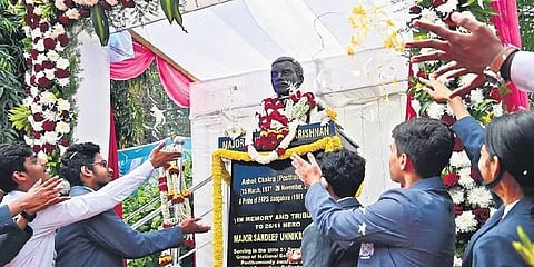 Students pay tributes to the bust of Major Sandeep Unnikrishnan at Frank Anthony Public School in Bengaluru on Saturday | Shashidhar Byrappa