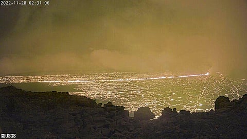 This image provided by the USGS Hawaiian Volcano Observatory shows a view from a research camera on the north rim of the summit caldera of the Mauna Loa volcano, Nov. 28, 2022.  (Photo | AP)