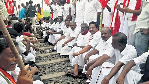 DMK and its allies squat on railway tracks  as part of rail roko near Koradacherry station | Express
