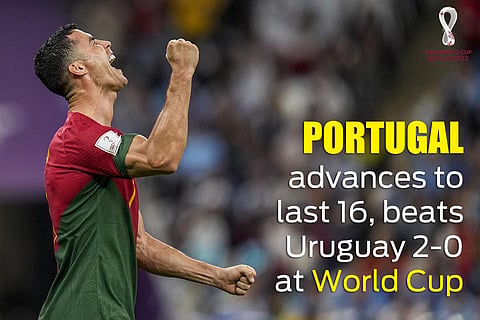 Portugal advanced to the last 16 by winning over Uruguay 2-0 at FIFA World Cup 2022. Cristiano Ronaldo wheeled away in celebration, acting as though he had scored once again at the World Cup. (Photo | AP)