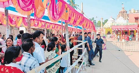 Devotees waiting in queues to enter Gopinath temple at Sakhigopal | Express