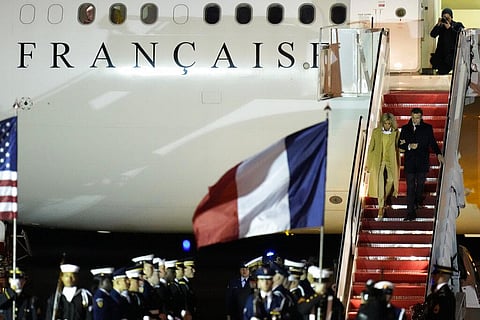 French President Emmanuel Macron with his wife Brigitte Macron arrive at Andrews Air Force Base, Maryland, Nov. 29, 2022. (Photo | AP)