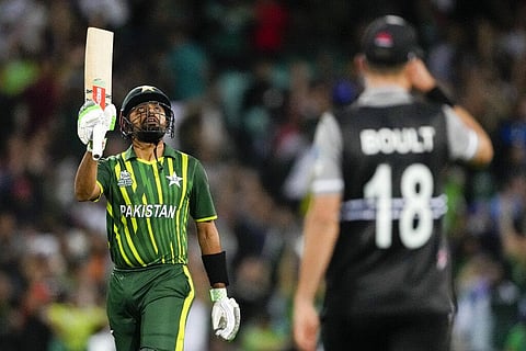 Pakistan skipper Babar Azam gestures with his bat after scoring a half century during the T20 World Cup cricket semifinal in Sydney, Nov. 9, 2022. (Photo | AP)