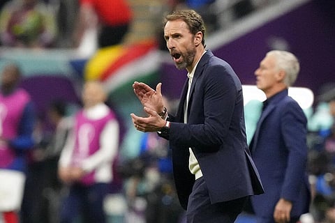 England's head coach Gareth Southgate applauds during the World Cup quarterfinal fixture between England and France, at the Al Bayt Stadium in Al Khor,  Dec. 10, 2022. (Photo | AP)