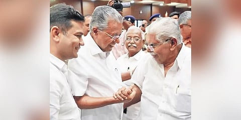 Chief Minister Pinarayi Vijayan greets Congress leader Vayalar Ravi at the  P S John endowment award function in Kochi on Saturday. MP Hibi Eden looks on | Express