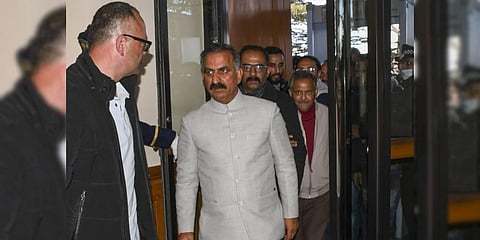 Congress MLA Sukhvinder Singh Sukhu arrives at the party office to attend a meeting, at The Oberoi Cecil in Shimla. (Photo | PTI)