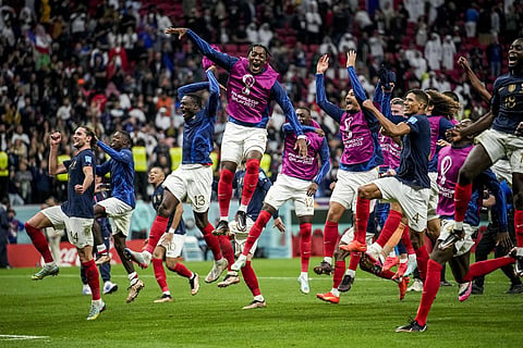 France players celebrate after their quarterfinal match against England on Saturday. (Photo | AP)