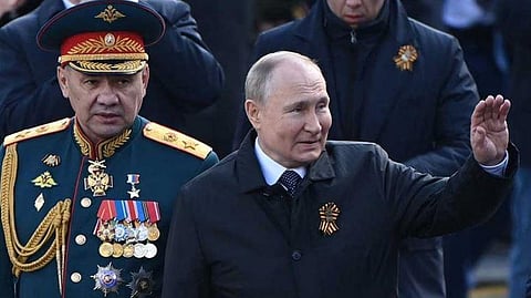Russian President Vladimir Putin and Defence Minister Sergei Shoigu leave Red Square after the Victory Day military parade in central Moscow. (Photo | AP)