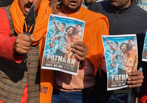 Bajrang Dal activists stage a protest, in Jammu, Saturday, Dec. 17, 2022. (Photo | PTI)