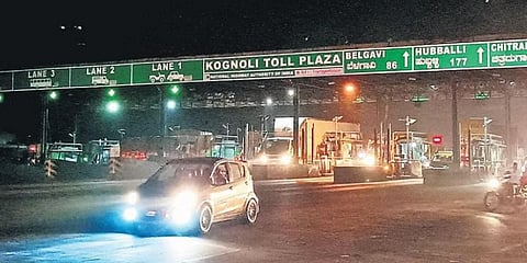 Vehicles pass through the Kognoli toll plaza along the Karnataka-Maharashtra border. (File Photo | EPS)