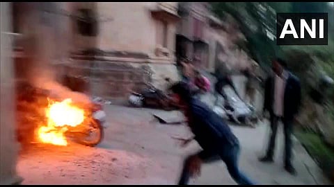 Protests over fee hike in Allahabad University premises in Prayagraj turned violent. (Photo | ANI Twitter)