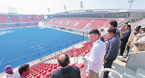 Chief secretary SC Mahapatra, 5T secretary VK Pandian and sports secretary R Vineel Krishna inspecting arrangements at Birsa Munda Hockey stadium I EXPRESS