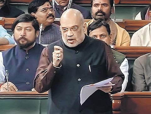 Home Minister Amit Shah speaks in the Lok Sabha on Wednesday. (Photo | PTI)