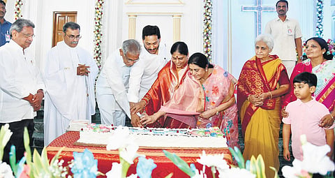 Chief Minister YS Jagan Mohan Reddy cuts Christmas cake at CSI Church at Pulivendula in Kadapa district on Sunday I Express