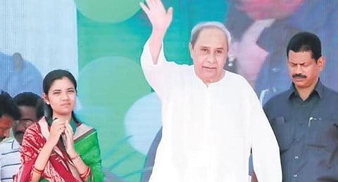 Chief Minister Naveen Patnaik waves to the crowd at a rally in Padampur | Express