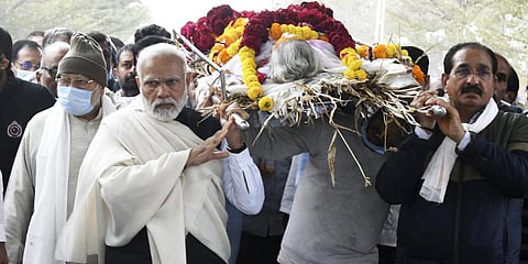 Prime Minister Narendra Modi carries the mortal remains of his mother Heeraben Modi, who passed away at the age of 100, in Gandhinagar, on December 30, 2022. (Photo  | PTI)