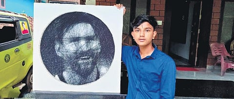 K Diljith with the string art of  Lionel Messi
