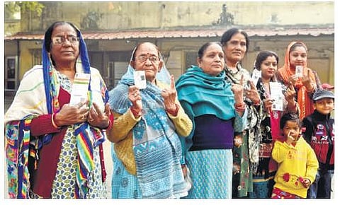 Voters show their fingers marked with indelible ink at Civil Lines | Parveen Negi