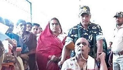 An ailing elderly man reaches a booth on a wheelchair to cast his vote | Express