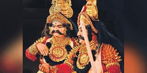 Yakshagana artistes perform  during Janapadotsava in Mysuru  on Thursday | Udayashankar S