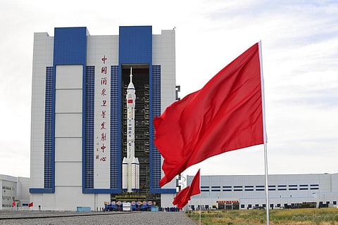 The  Shenzhou-12 manned spaceship with its Long March-2F carrier rocket is being transferred to the launching area of Jiuquan Satellite Launch Center in China. (File Photo | AP)