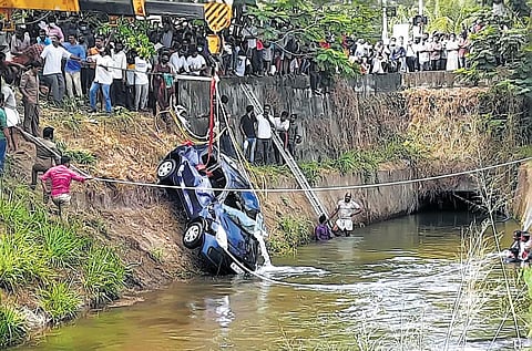The car involved in the accident being lifted from the canal in Adoor on Wednesday  | Express