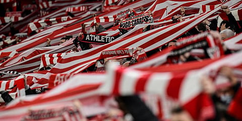 Athletic Club supporters cheer their team prior the start of their Spanish Copa del Rey semifinal first leg match against Valencia at the San Mames stadium in Bilbao, Spain, Feb 10, 2022. (Photo | AP)