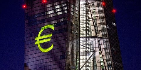 FILE - A light installation is projected onto the building of the European Central Bank during a rehearsal in Frankfurt, Germany, on Dec. 30, 2021. (Photo | AP)
