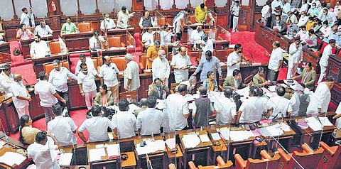 Congress MLCs protest in the well of the House on Monday |  nagaraja gadekal