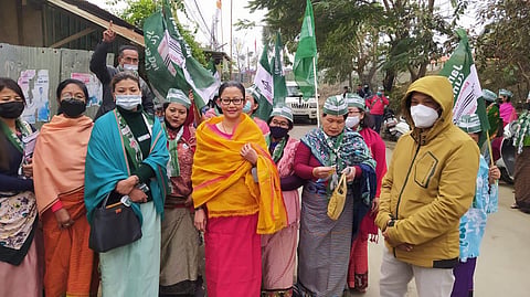 Former cop and JD(U) candidate Thounaojam Brinda during a door-to-door campaign in Imphal, Wednesday. (Photo | EPS)
