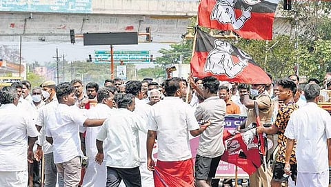 AIADMK cadre return from a counting centre after facing heavy defeat in polls in Tiruchy district