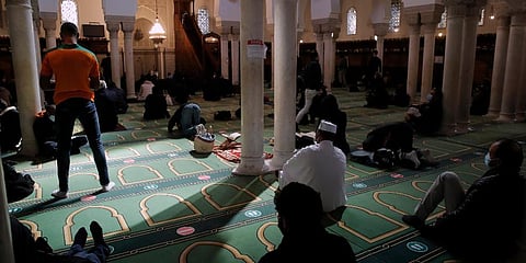 FILE - Muslims pray during the first day of the holy fasting month of Ramadan, at the Paris Mosque, Tuesday, April 13, 2021. (Photo | AP)