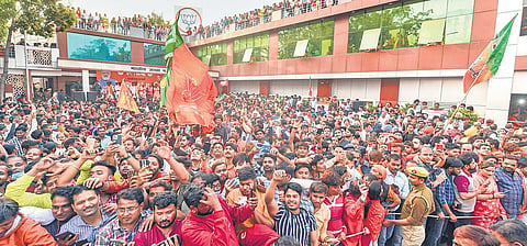 BJP leaders, workers at party office in Lucknow on Thursday following the resounding win in four states | PTI