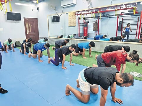 Participants  practising the  baby beast  movement